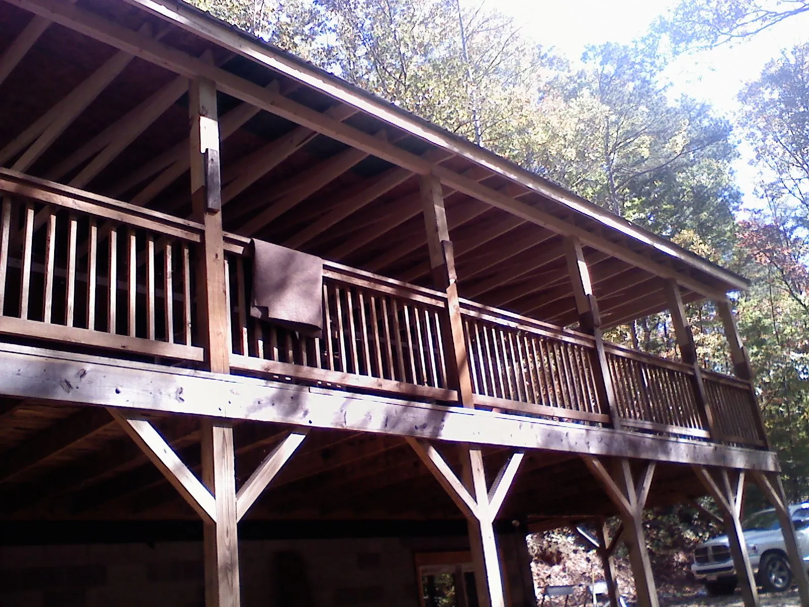 Timber framing under a new elevated porch and deck — Roof Leak Repair in Culver by Roofing Brothers